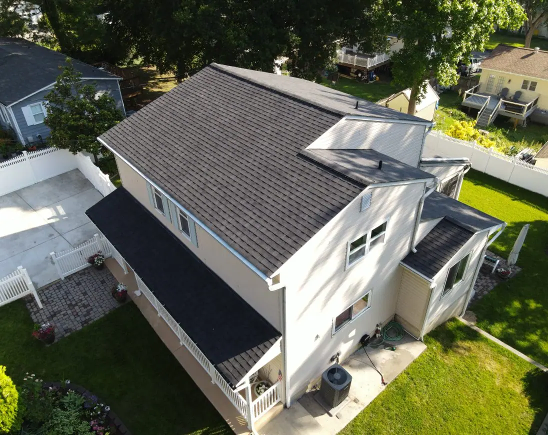 New dark shingle roof on a Maryland home, seen from above